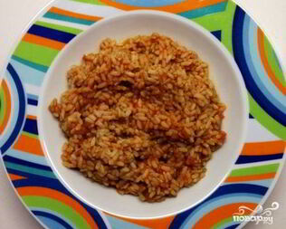 Рис с тушенкой в мультиварке