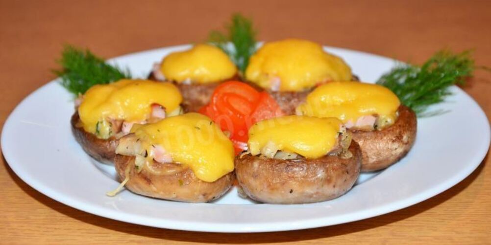 Рецепт фаршированных шампиньонов под сырной шапочкой