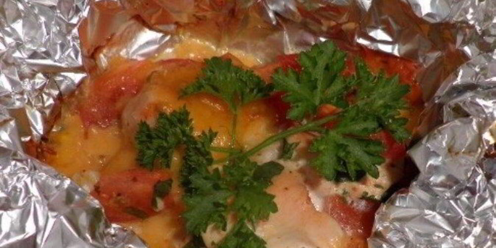 Рецепт курицы в духовке с помидорами