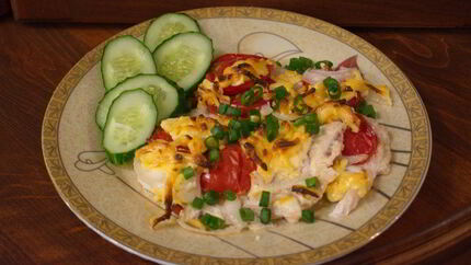 Отбивные в духовке с помидорами и сыром