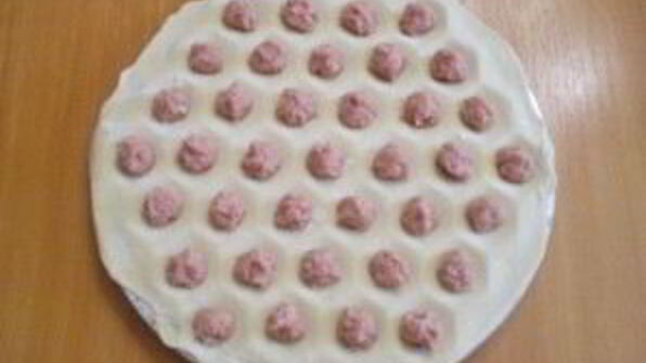 пельмени под соусом