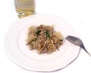 Ризотто с трюфельной пастой, белым вином и вешенками