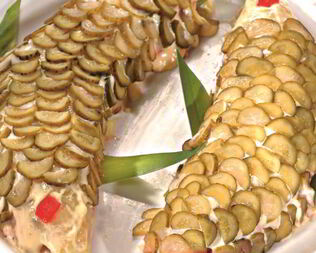 Селедка под шубой с солеными огурцами