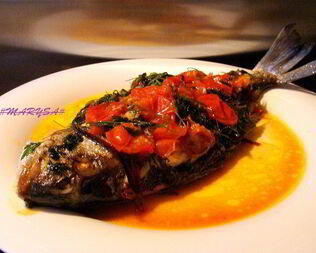 Дорада в сумасшедшем бульоне