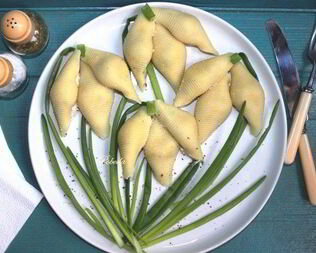 Конкильони — закуска из печени трески в ракушках